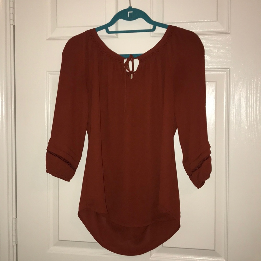 burnt orange blouse